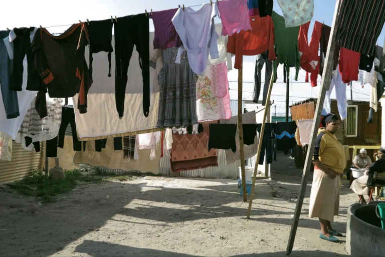 A photo of laundry drying in an informal settlement in Khayalitsha, Cape Town.